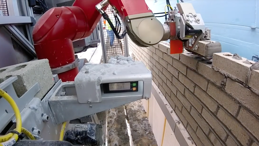 A collaborative robot in construction work being utilised by various companies.