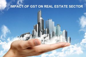 Image of A Hand Holding The Real Estate Buildings Which Describes The Concept of GST on Real Estate Sector. 