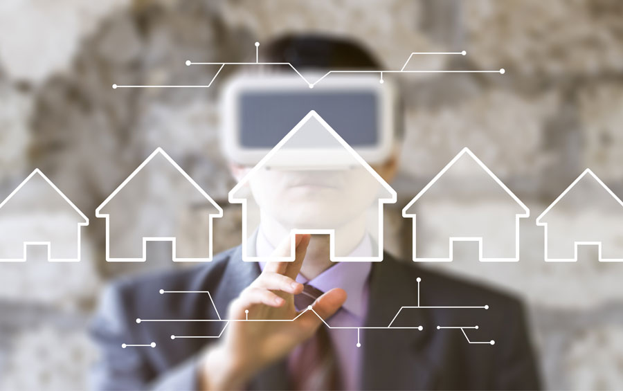 Real estate business person pointing towards the screen which displays real estate graph.